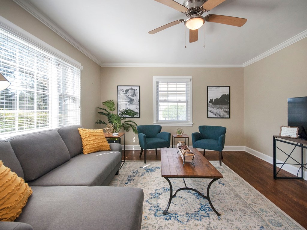 a living room with a couch and a coffee table