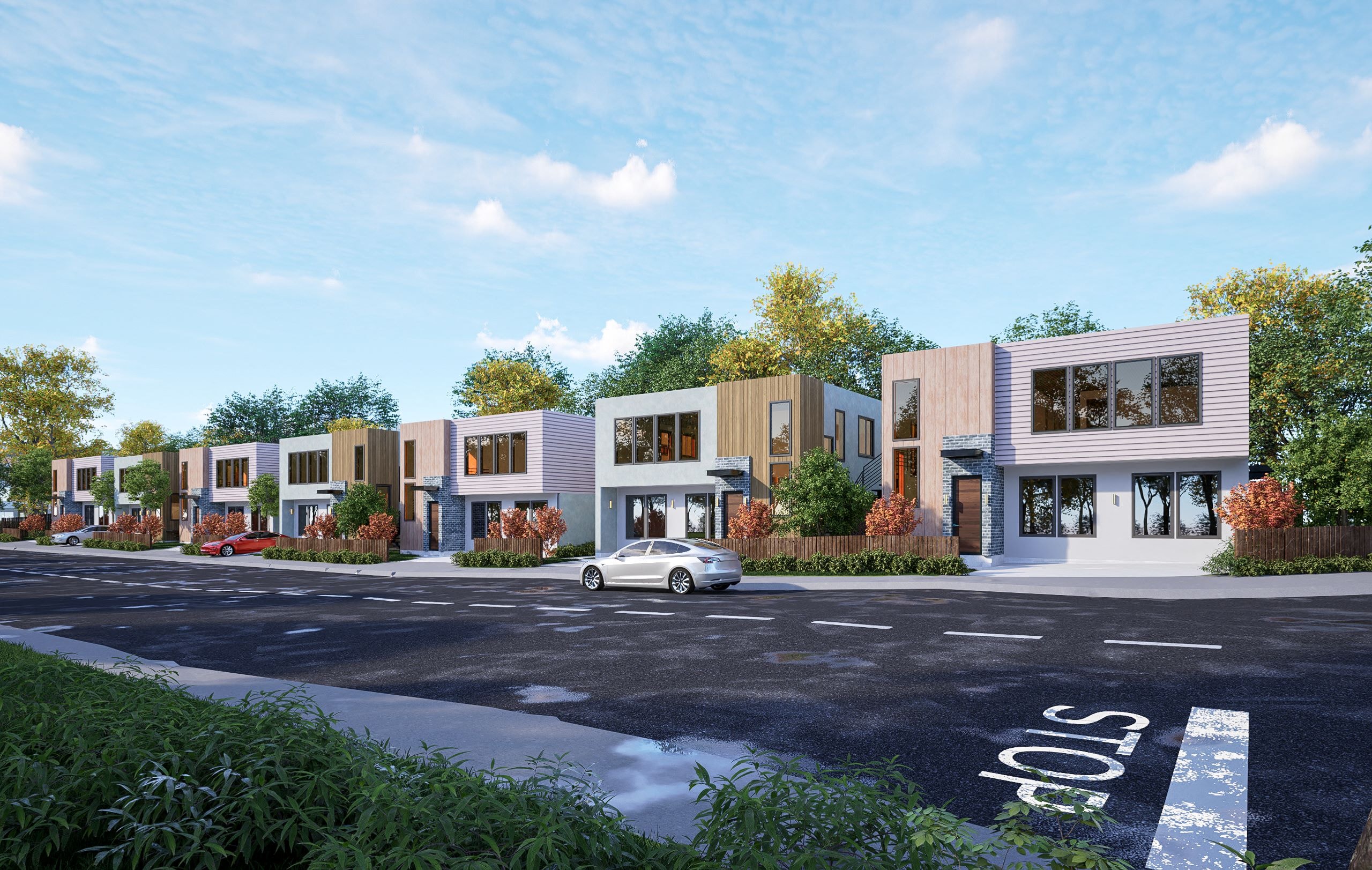 a rendering of a row of townhouses with a car on a street