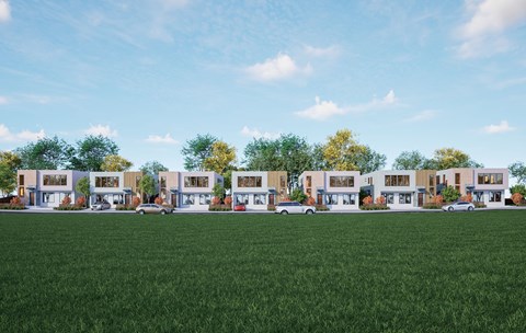a rendering of a row of town houses with green grass in the foreground