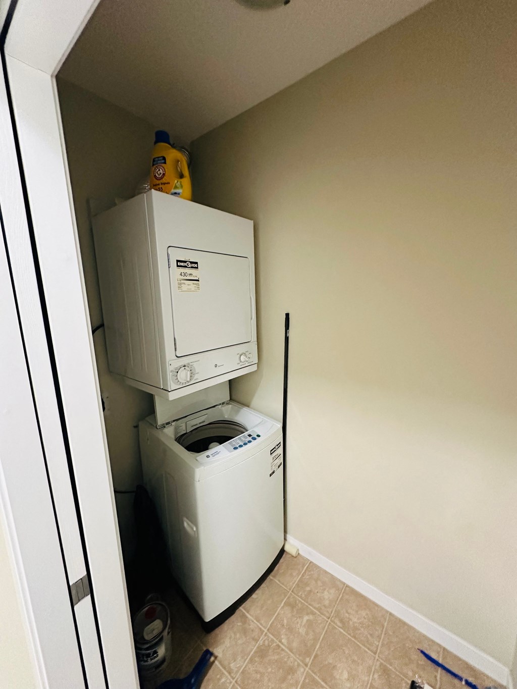 the laundry room has a washer and dryer in it