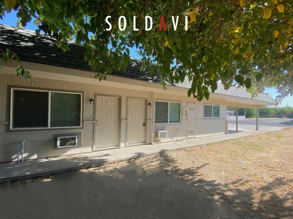 A house with the word SOLD A VI on it.