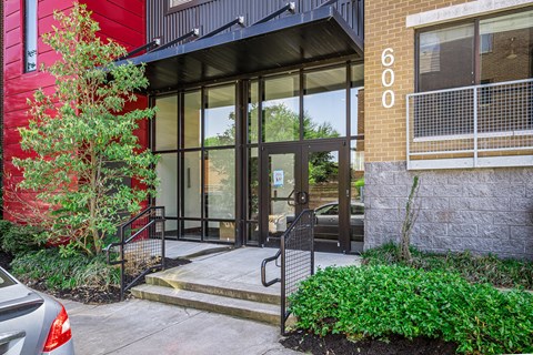 the entrance to a building with glass doors
