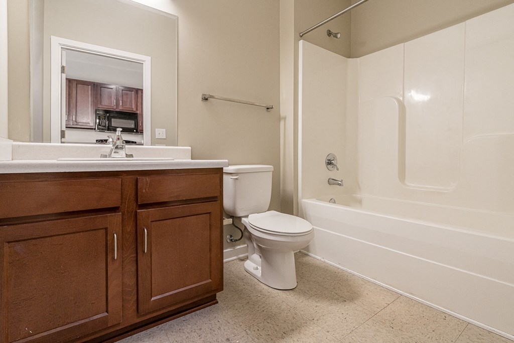 the preserve at ballantyne commons apartment bathroom with toilet sink and tub
