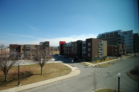 a view of a city street with some buildings