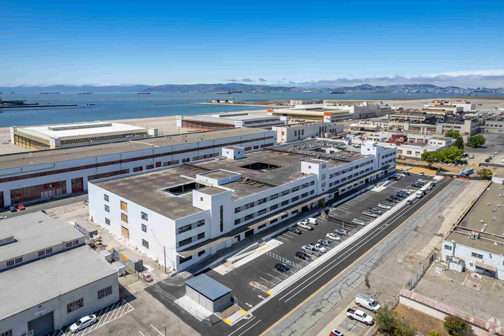 an aerial view of a large building in a city