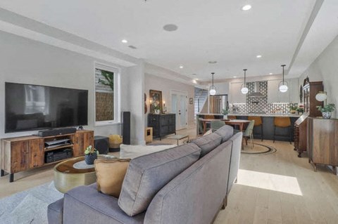a living room with a couch and a television