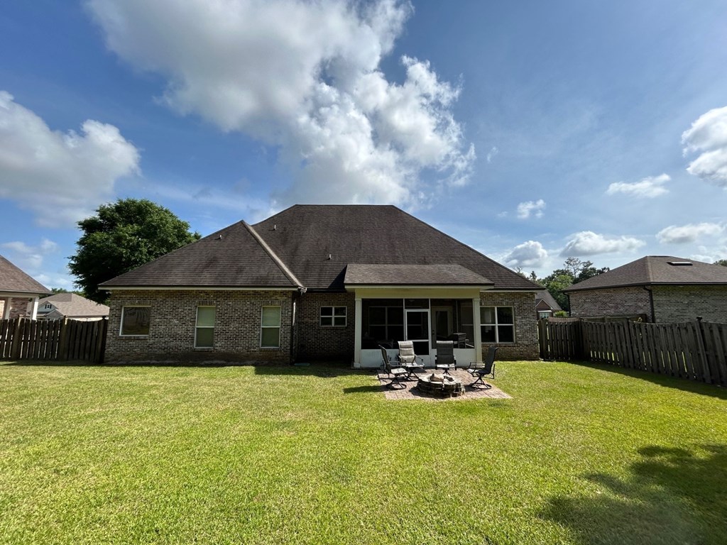a view of the backyard from the back of a house