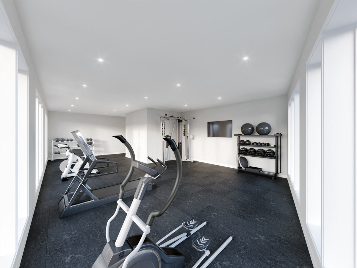 A modern home gym with treadmills and elliptical machines.
