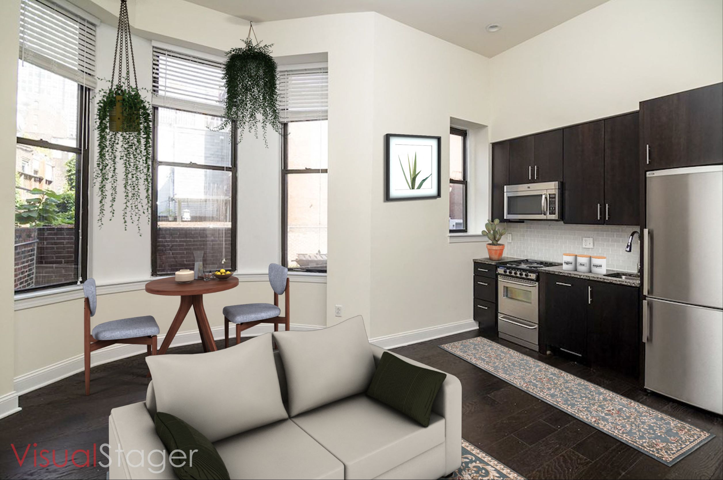 a kitchen and living room with a couch and a table