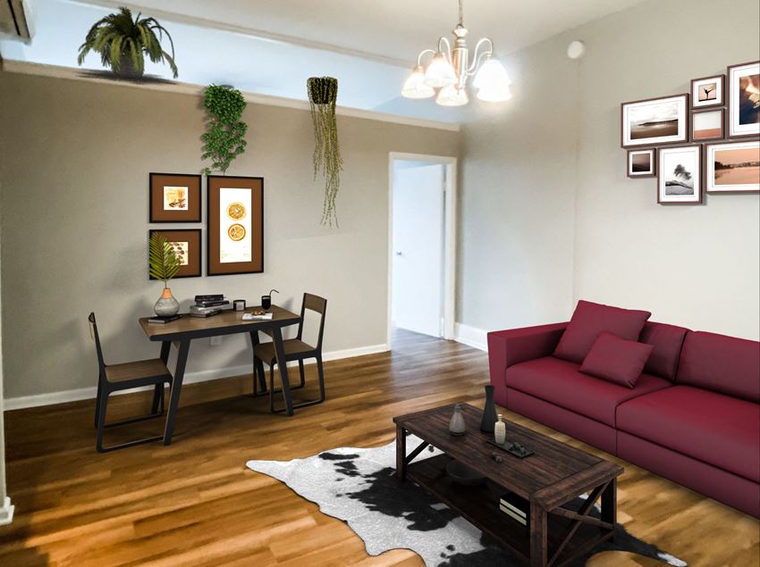 a living room with a couch and a dining room table