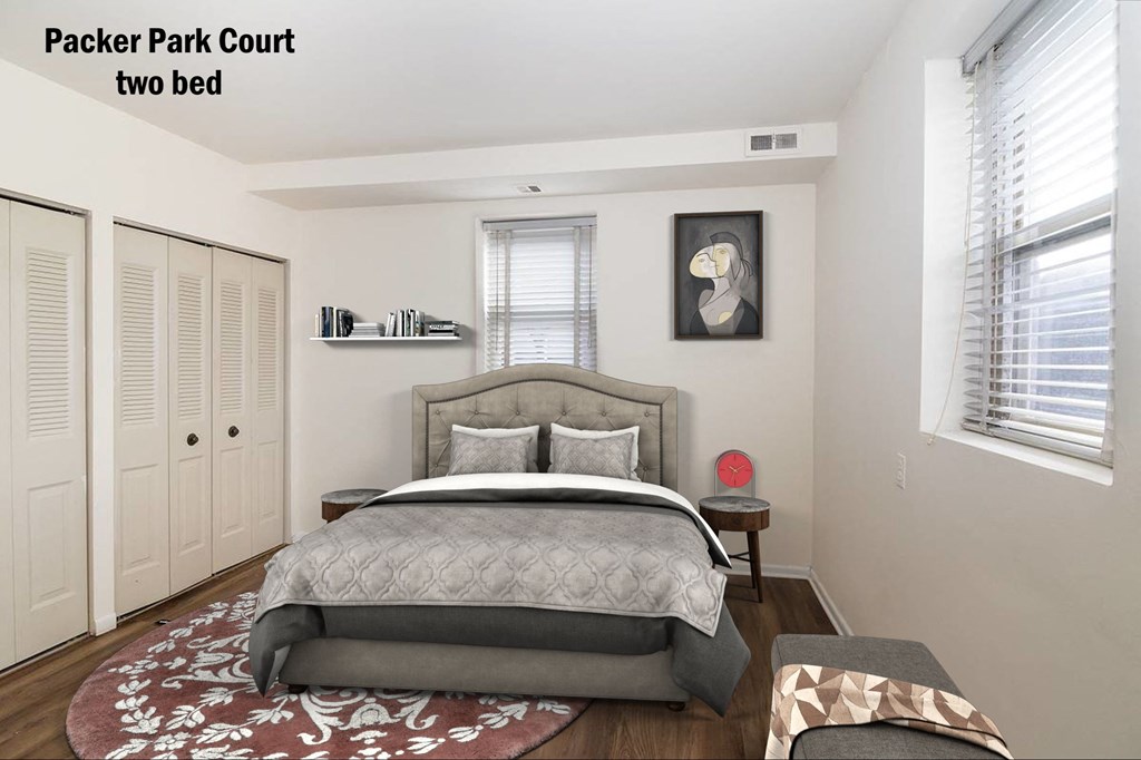 a bedroom with a bed and a closet