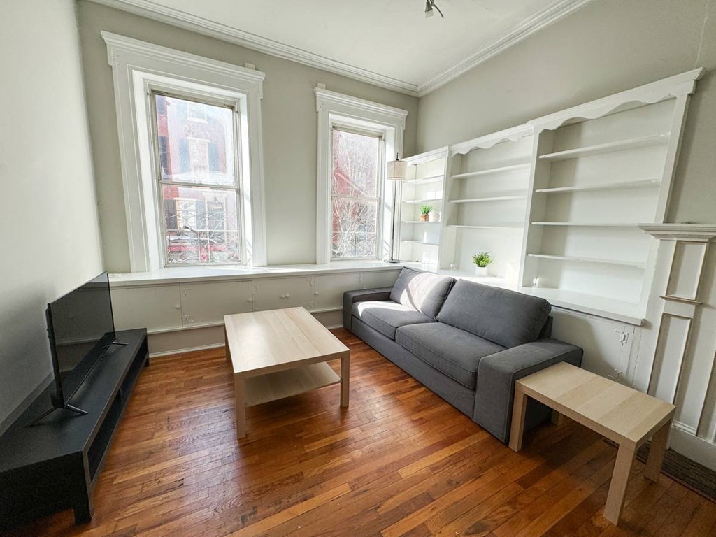 a living room with a couch and a coffee table