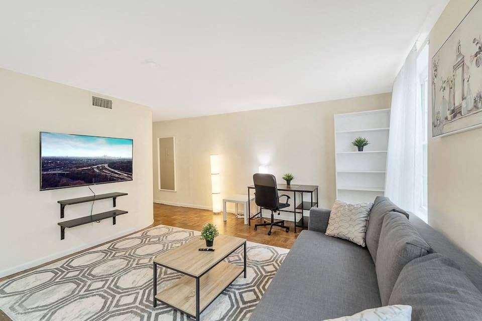 a living room with a couch and a coffee table