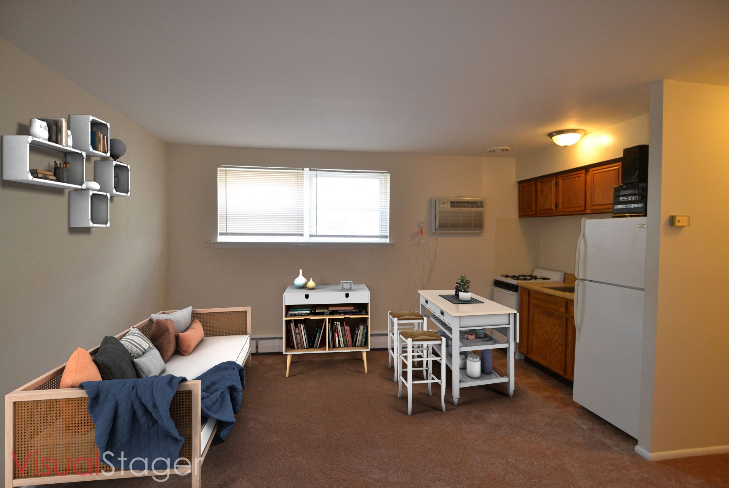 a living room with a couch and a table and a kitchen