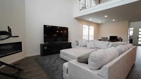 a living room with a couch and a television