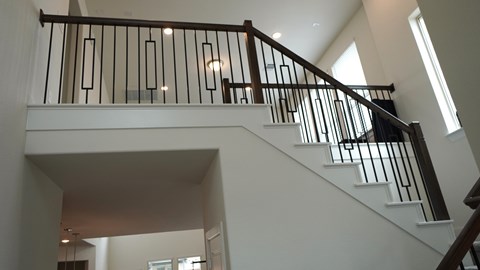 the view from the bottom of the stairs in a home