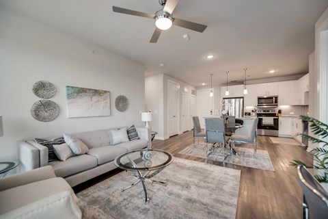 a living room with a couch and a table