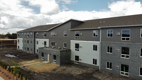 an aerial view of an apartment building under construction