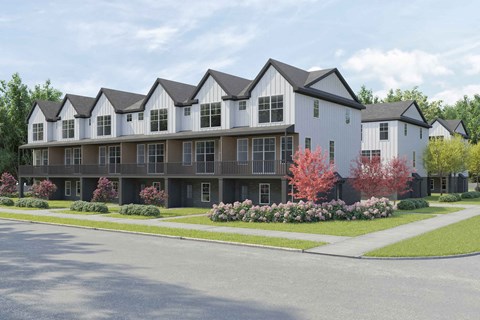 a rendering of an apartment building with a street in front
