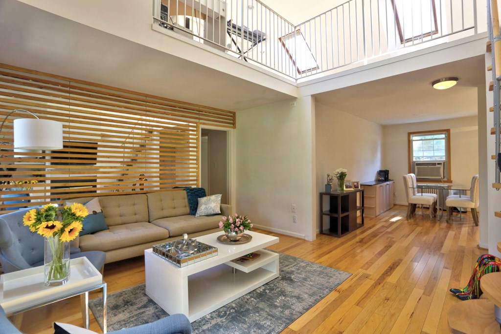 a living room with a couch and a coffee table