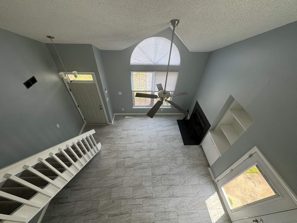 a view of the living room from the top of the stairs
