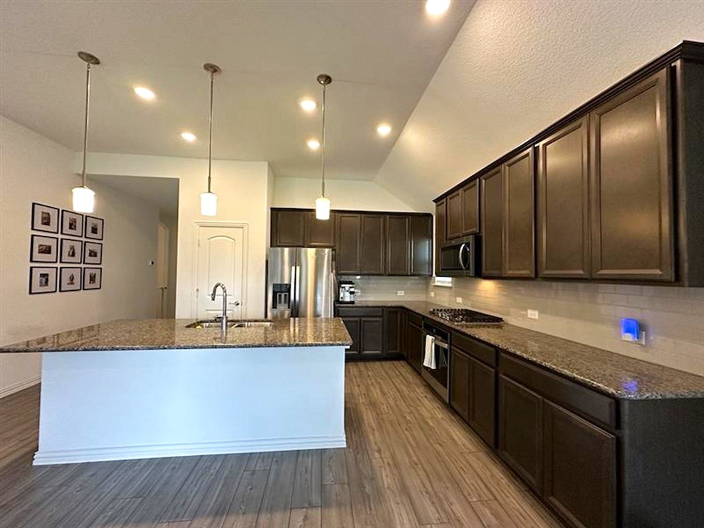 a large kitchen with a counter top