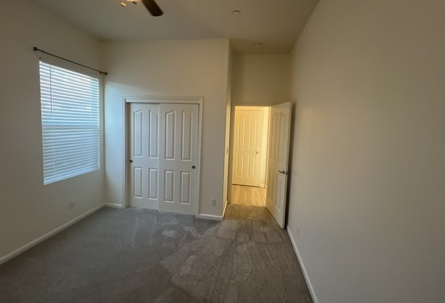 a empty room with a door and a window and