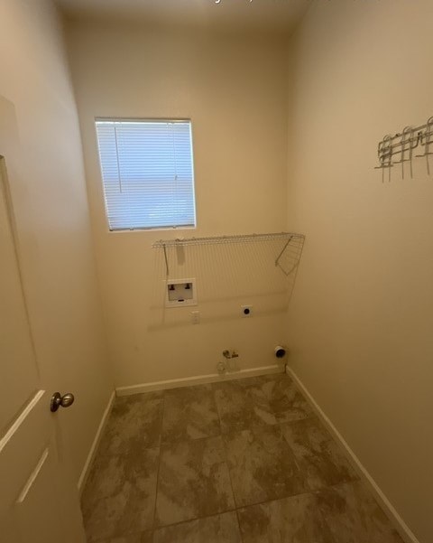 a small bathroom with a toilet and a window