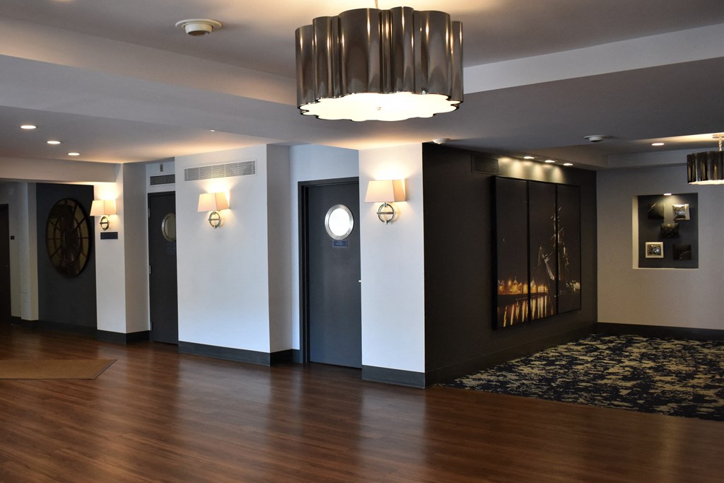 a view of the lobby from the front of the room showing the elevators