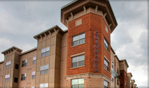 a large brick building with a tower on top of it