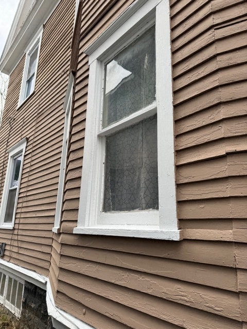 a window on the side of a house
