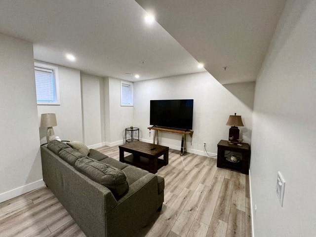 a living room with a couch and a television