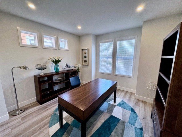 a living room with a table and a tv