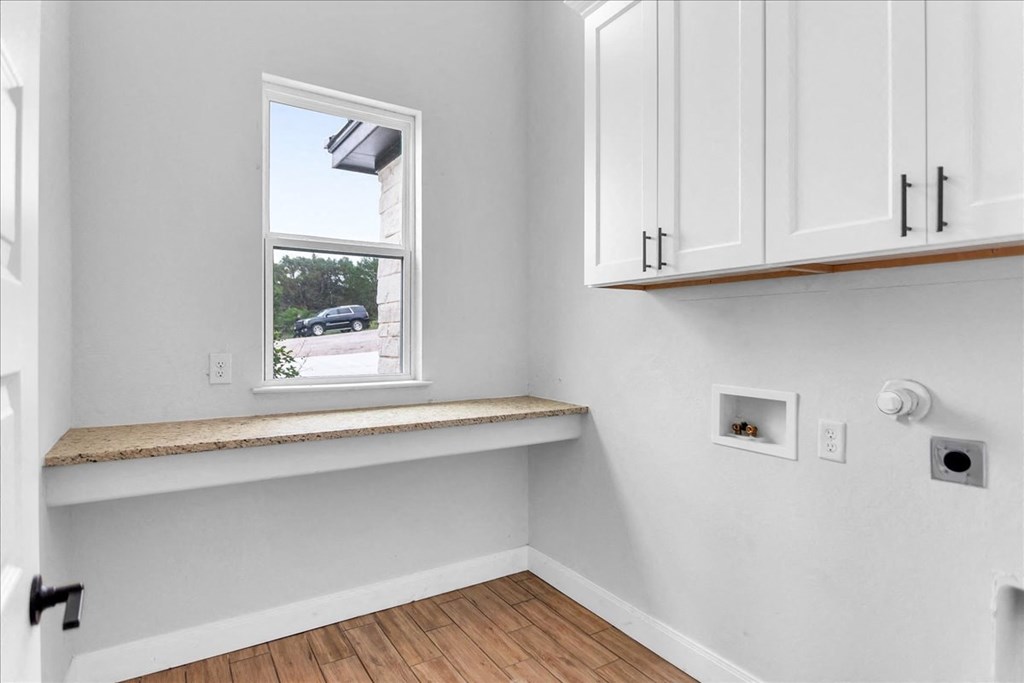 a small room with a window and a counter
