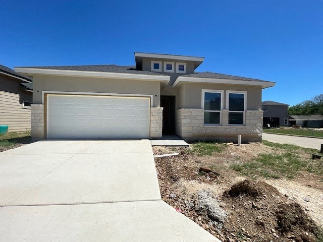 a house with a driveway and a garage door