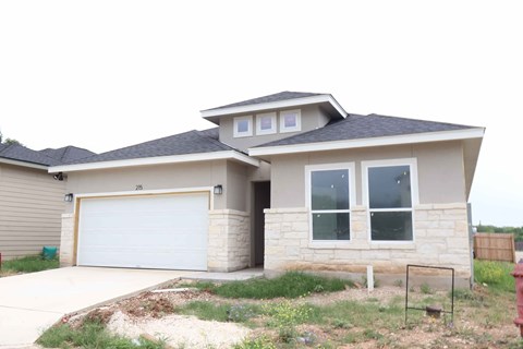 a house with a garage and a driveway