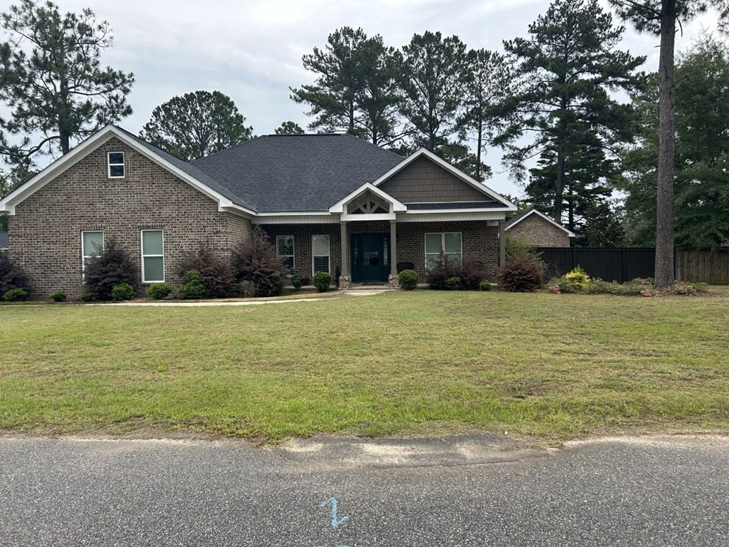 a house with a lawn in front of it