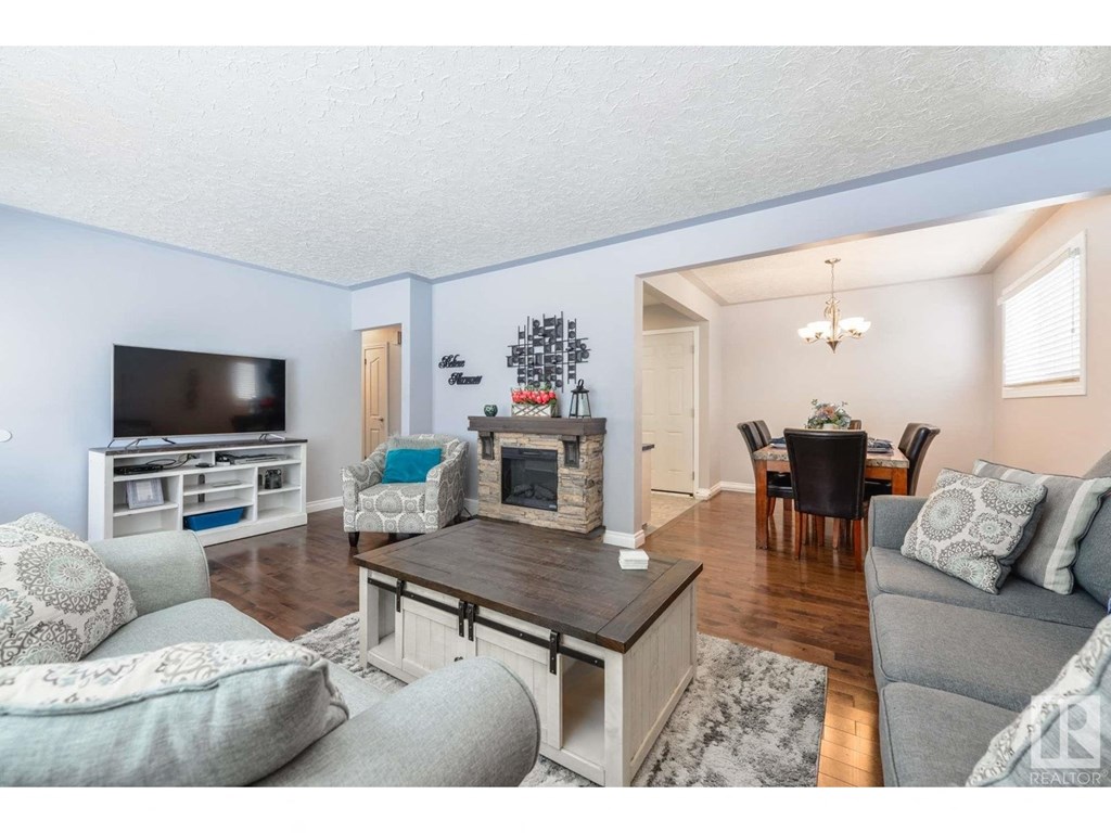 a living room with a couch and a tv