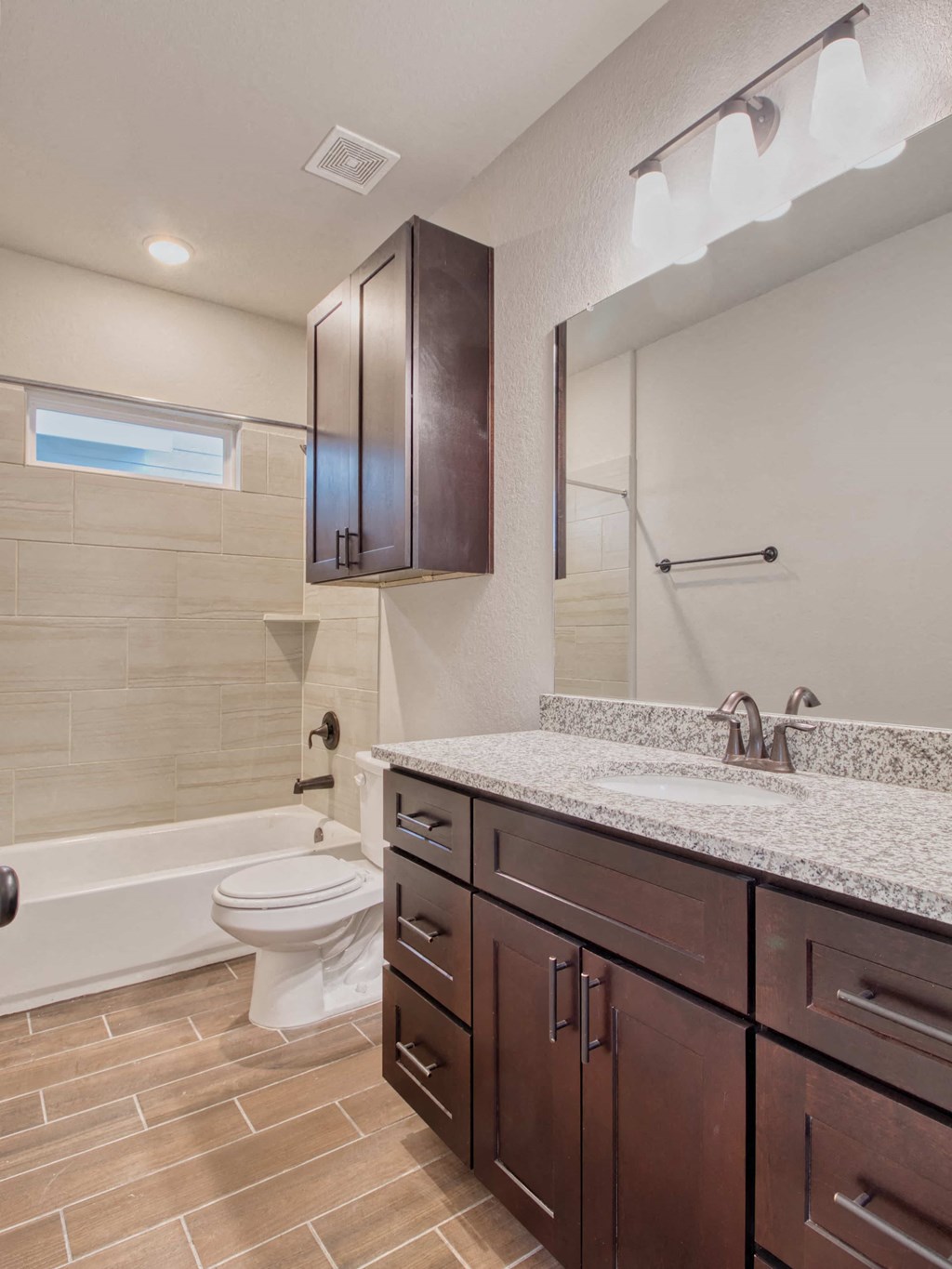 a bathroom with a sink and a toilet