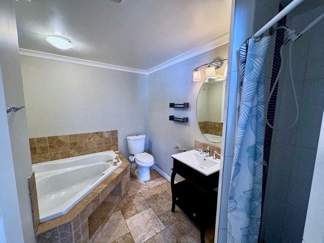a bathroom with a tub and a sink and a toilet