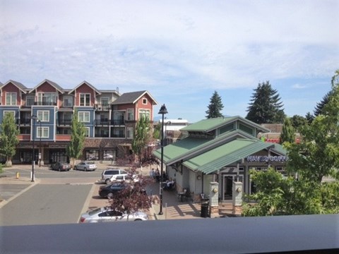 a view of a city street from a window