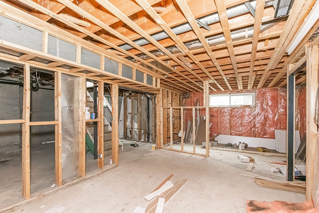 a house being remodeled with wood framing and insulation