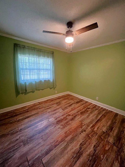 a living room with a wood floor and a ceiling fan