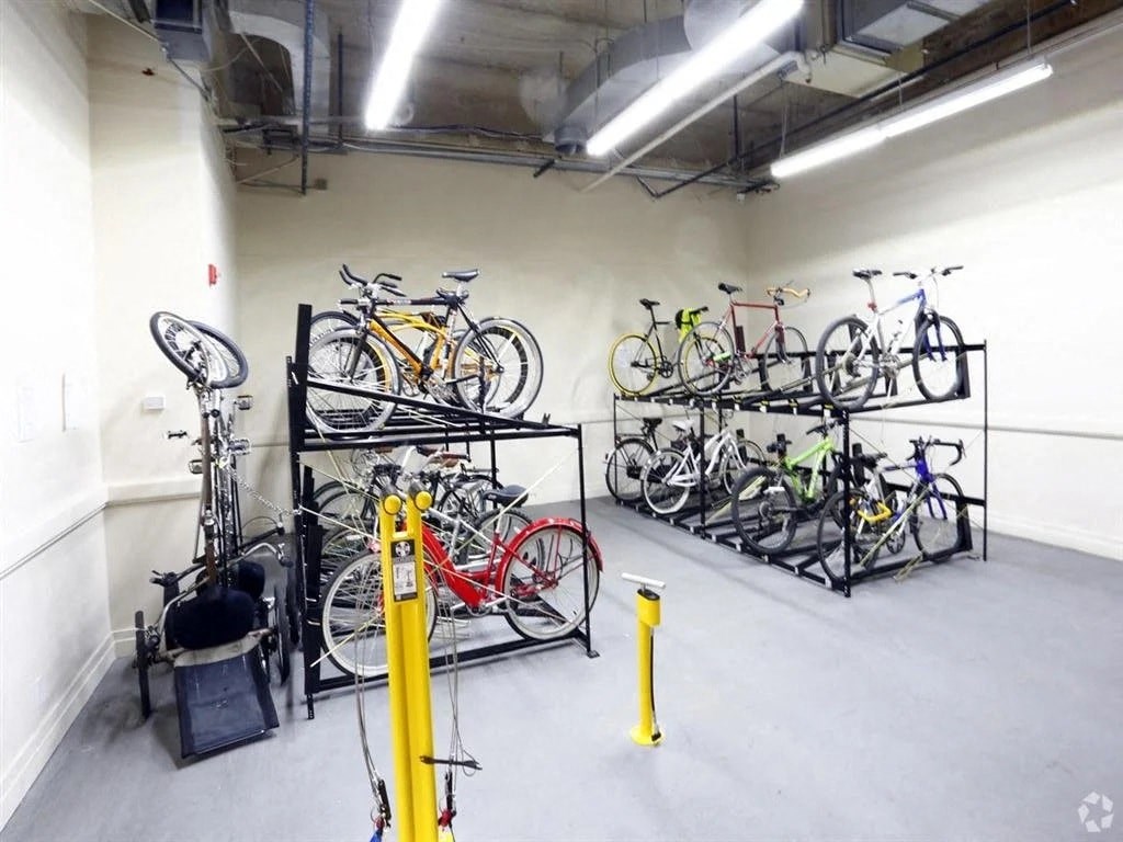 a group of bikes parked in a room