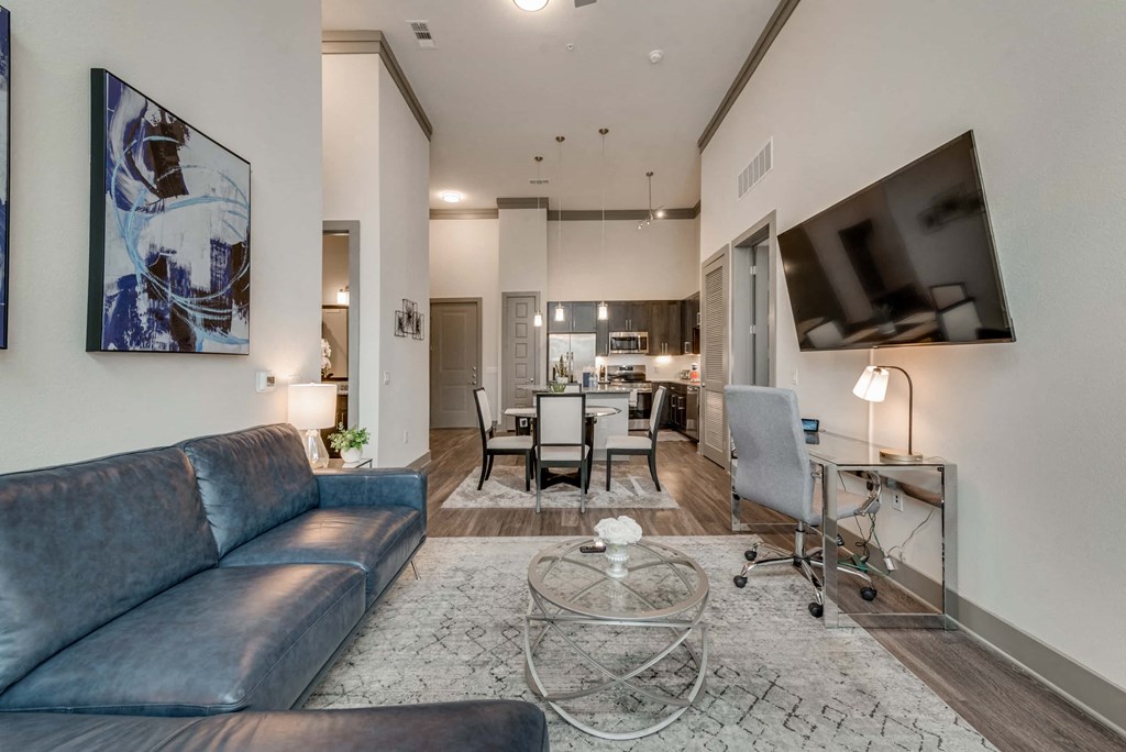 a living room with a couch and a table