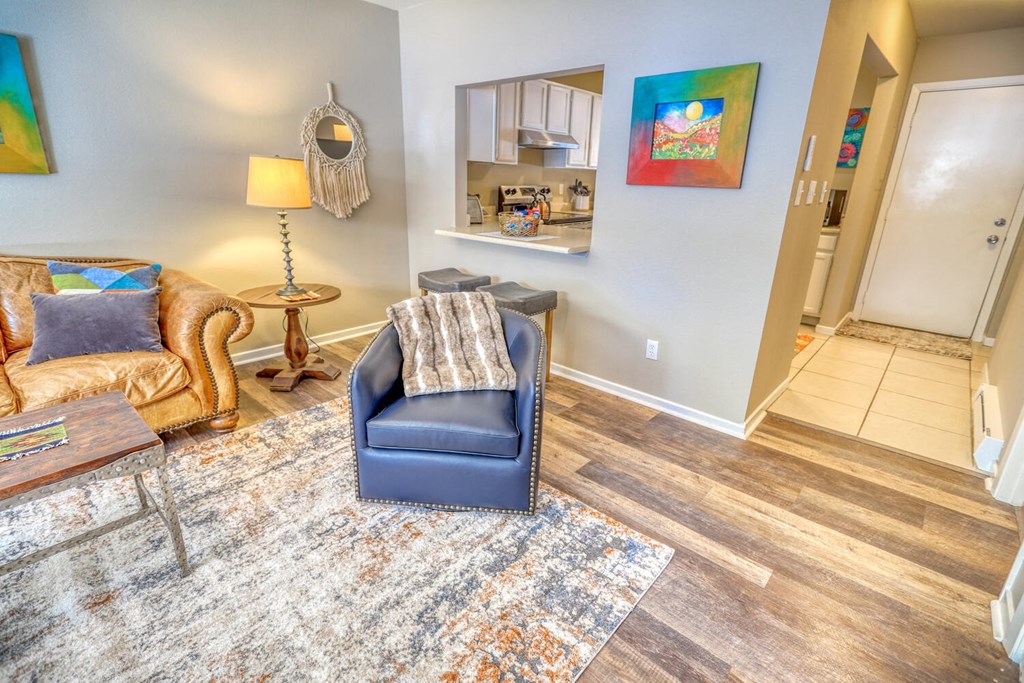 a living room with a couch and a chair