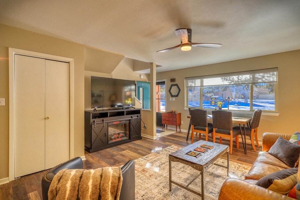 a living room with a couch and a table