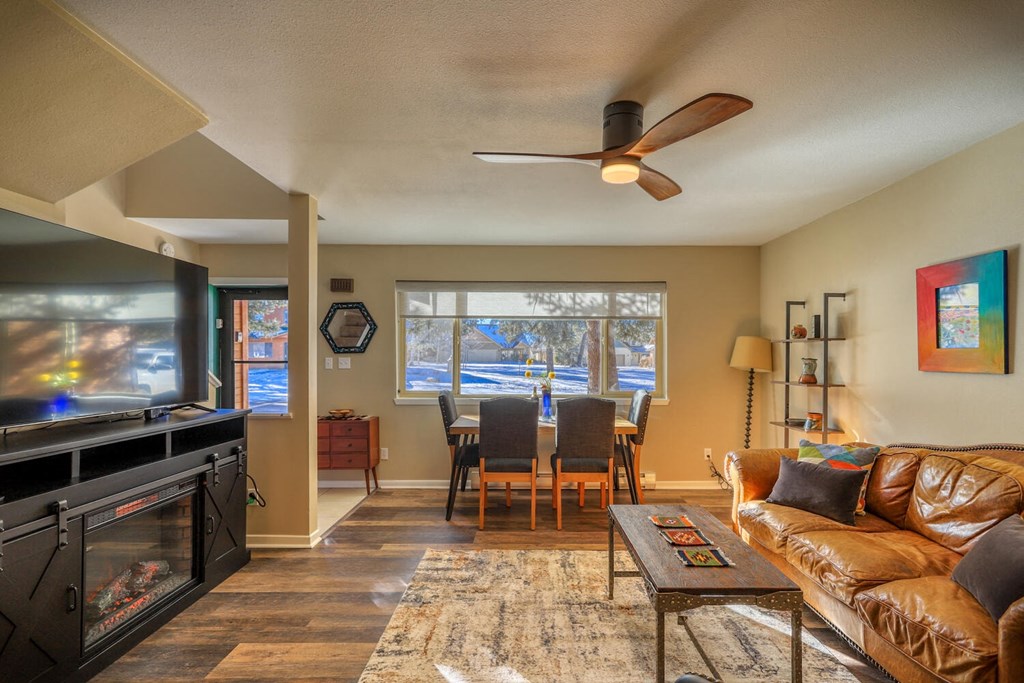 a living room with a couch and a tv
