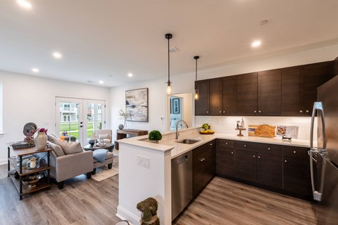 a kitchen and living room in a model home