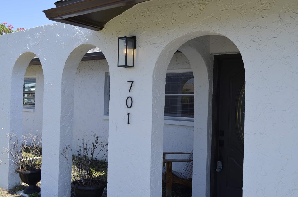 the front of a house with the number 7105 on it